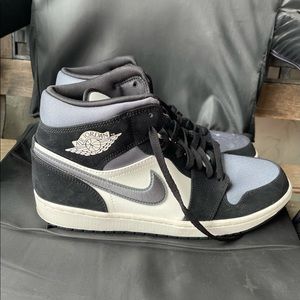 Black gray and white Jordan’s